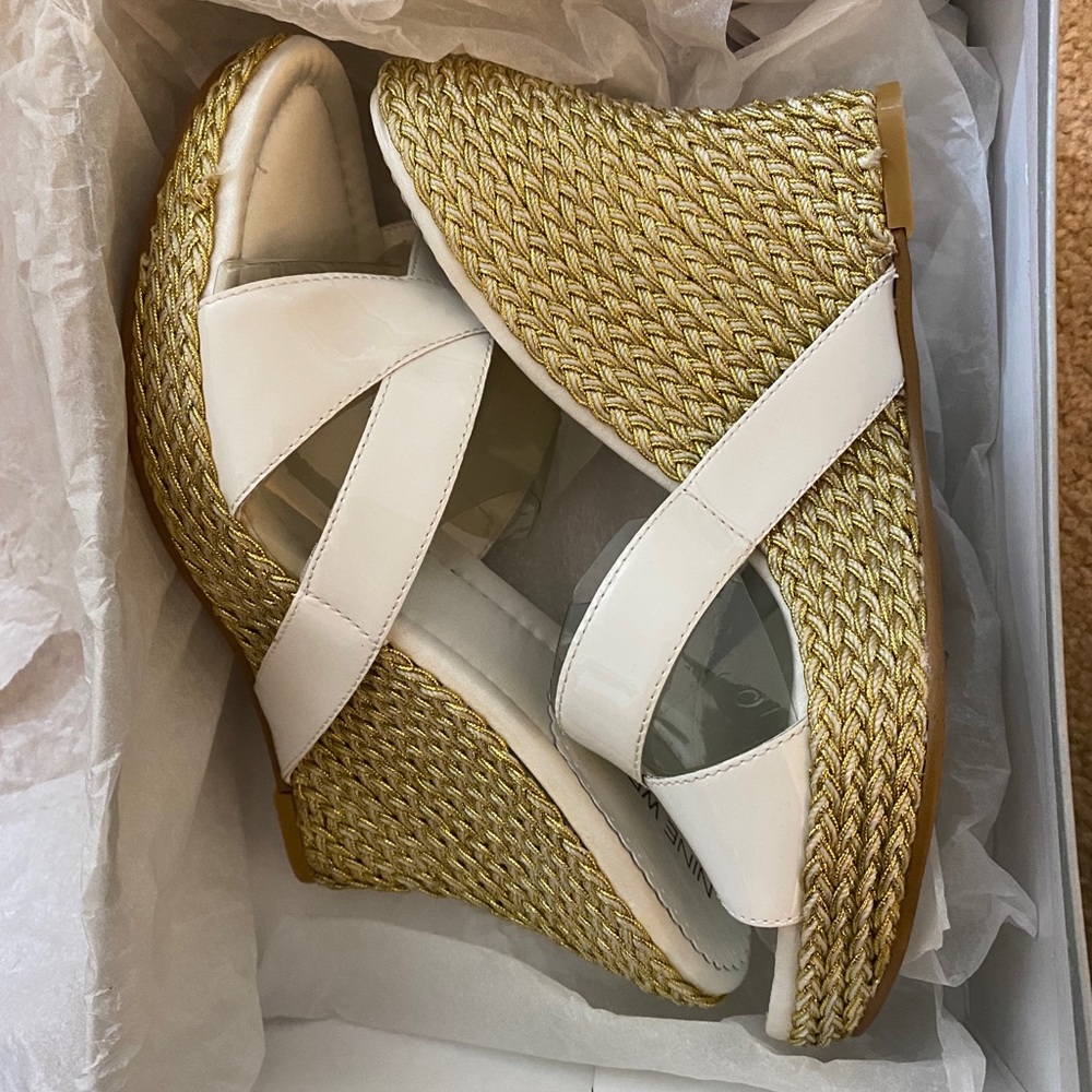 Women’s size 8 New in box 9 W. platform sandals.